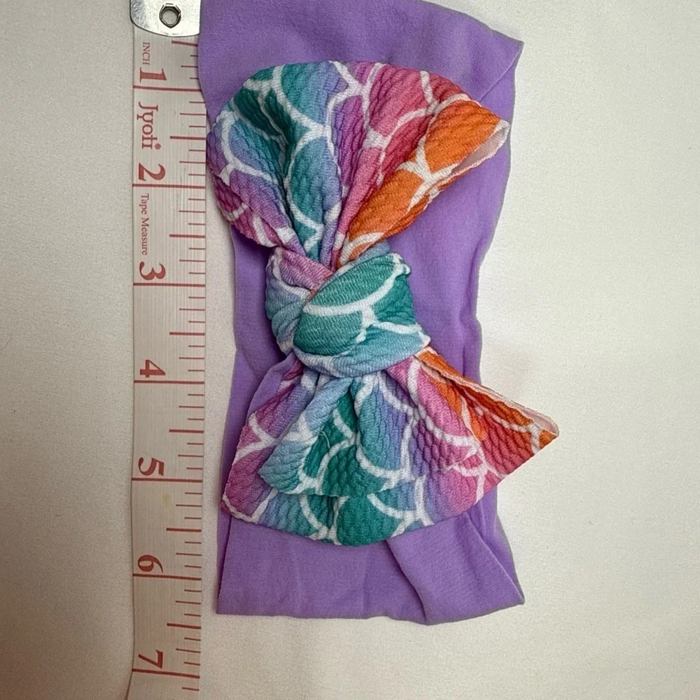 Vibrant Purple and Orange Hair Bow Accessory